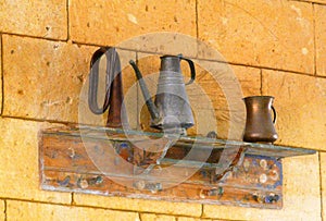 A decorative shelf with pitchers, design idea