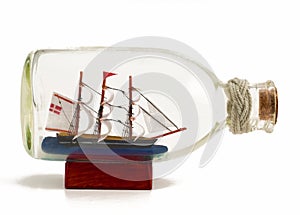 Decorative ship in glass bottle