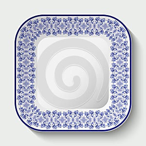 Decorative square plate with ornament in Gzhel style of national painting on porcelain.