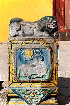 Decorative stone with cow carving by the entrance of a building in Gandan Monastery, Ulaanbaatar or Ulan-Bator, Mongolia