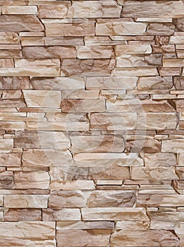 Decorative stone in the form of a sharp bumpy coffee-colored tile