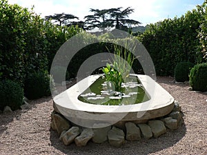 Decorative stone fountain pool