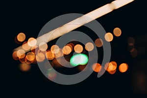 Decorative string lights at night time, Defocused Background, night city life backdrop, party time with Yellow bokeh