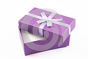 Decorative surprise gift box with pink ribbon