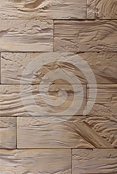 Decorative tile in the form of an stone