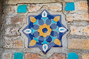 Decorative tile on the Gur-i Amir Mausoleum in Samarkand