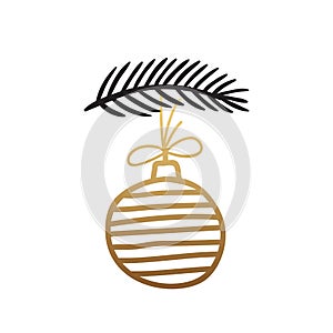 Decorative toy, golden ball in stripes weighs on a spruce branch. Symbol of Merry Christmas and Happy New Year. photo