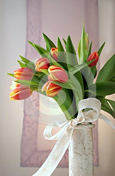 Decorative tulips in vase