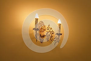 Decorative vintage wall sconce lamp candle with warm light