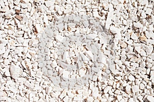 Decorative white stone rubble in nature as background
