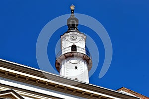 decorative white stucco fire watch tower in the city of Veszprem, Hungary. low angle view. famous landmark. old architecture