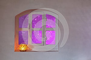 Decorative window with purple glow outside