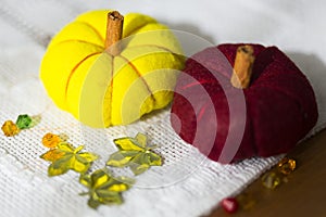 Decorative yelllow and red pumpkins made from felt