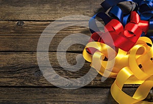 Decorative yellow, blue, red ribbon