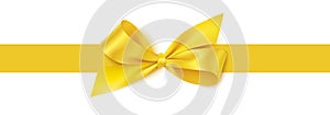 Decorative yellow bow with horizontal yellow ribbon isolated on white background.