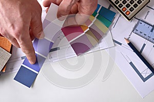 Decorator showing a color tone on work table top view