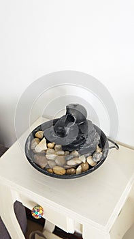 Decortative zen water fountain photo