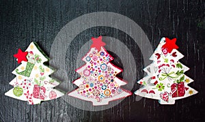 Decoupage Christmas tree decoration on black