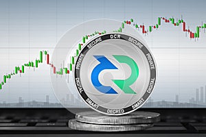 Decred; cryptocurrency coins - Decred DCR on the background of the chart photo