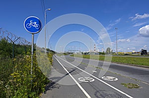 Dedicated lanes for cyclists with signs `Bicycle path`