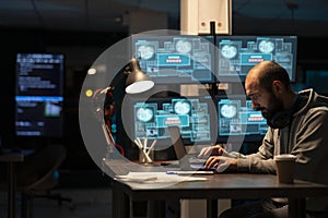 Dedicated Male Programmer Writing Secure Software Code