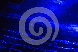 Deep blue night pool water