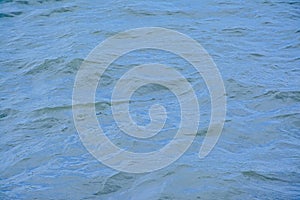 Deep blue rippling water surface