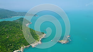 Deep blue water surface island coast aerial view