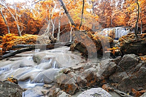 Deep forest waterfall in autumn scene at Erawan waterfall Nation