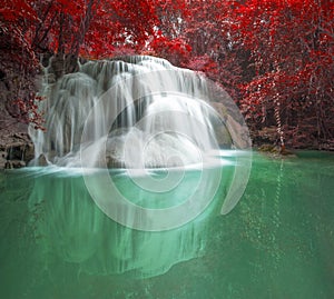 Deep forest waterfall in autumn scene at Huay Mae Kamin waterfall National Park Kanjanaburi Thailand photo