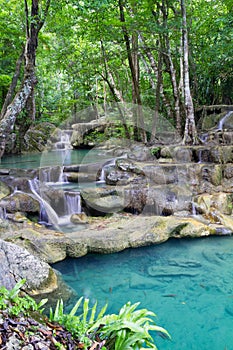 Deep forest waterfall (Erawan Waterfall) in Thailand