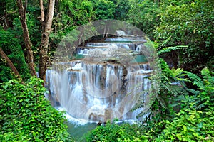 Deep forest Waterfall in Kanchanaburi, Thailand photo