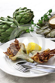 Deep fried artichoke, carciofi alla giudia photo