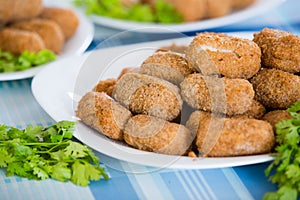 Deep fried breadcrumbed kroketten photo