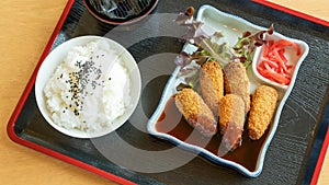 Deep fried chicken tenderloin with Japanese curry, rice, and soup