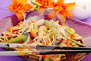 Deep fried chicken with vegetables and noodles