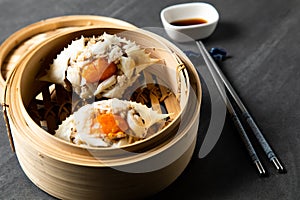 Deep-fried crab meat and minced pork in crab shell Pu Ja. Chinese Traditional cuisine concept. Dumplings Dim Sum in bamboo