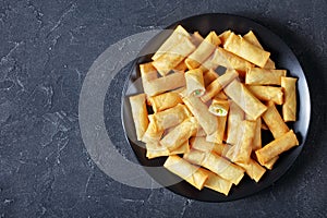 Deep fried crispy chinese spring rolls, flatlay