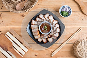 Deep Fried Crispy Pork Belly Cooked with Garlic and spicy dipping sauce