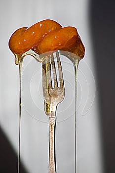 Deep fried dough dripping in syrup