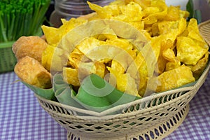 Deep fried dumpling in basket at market