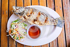 deep fried fish serve with fish sauce