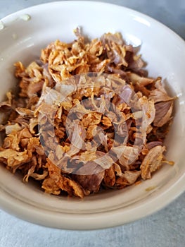 Deep fried garlic in the small bowl