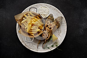 Deep Fried goby fish with fried potatoes