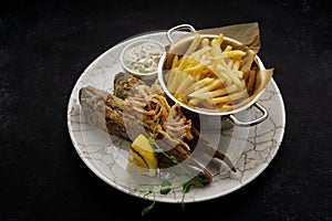 Deep Fried goby fish with fried potatoes