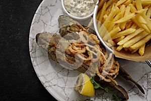 Deep Fried goby fish with fried potatoes