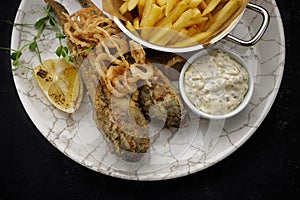Deep Fried goby fish with fried potatoes