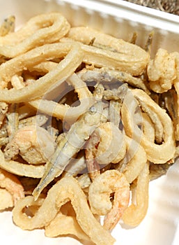 Deep fried mixed with shrimps and squid in the fish restaurant