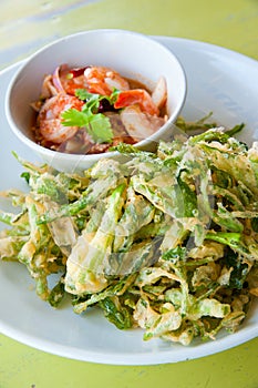 Deep fried morning glory with salad