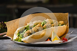 Deep fried mussels in bread and with greens on the side. Turkish name Midye Tava
